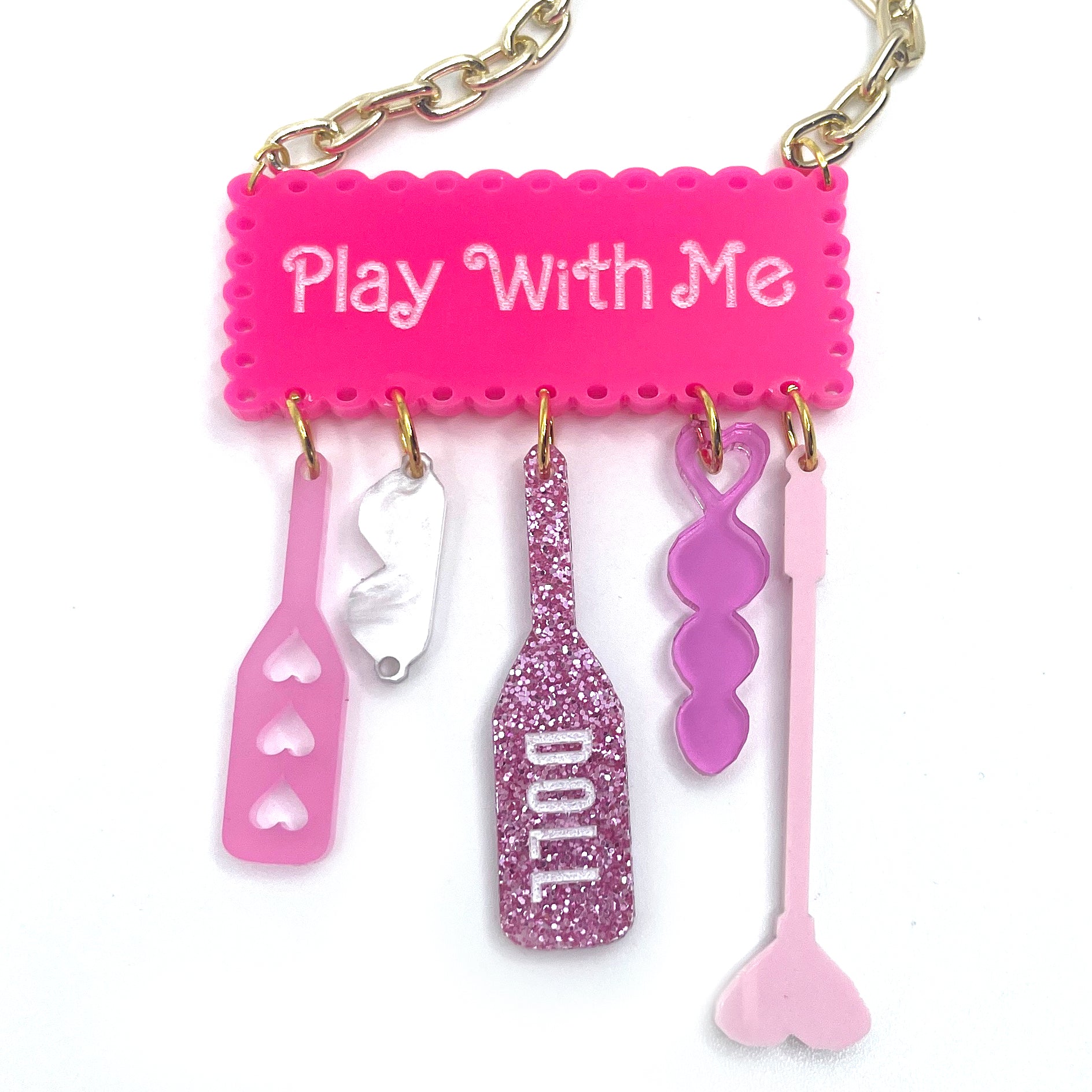 Pink glitter paddle shaped keychain, bondage keyring