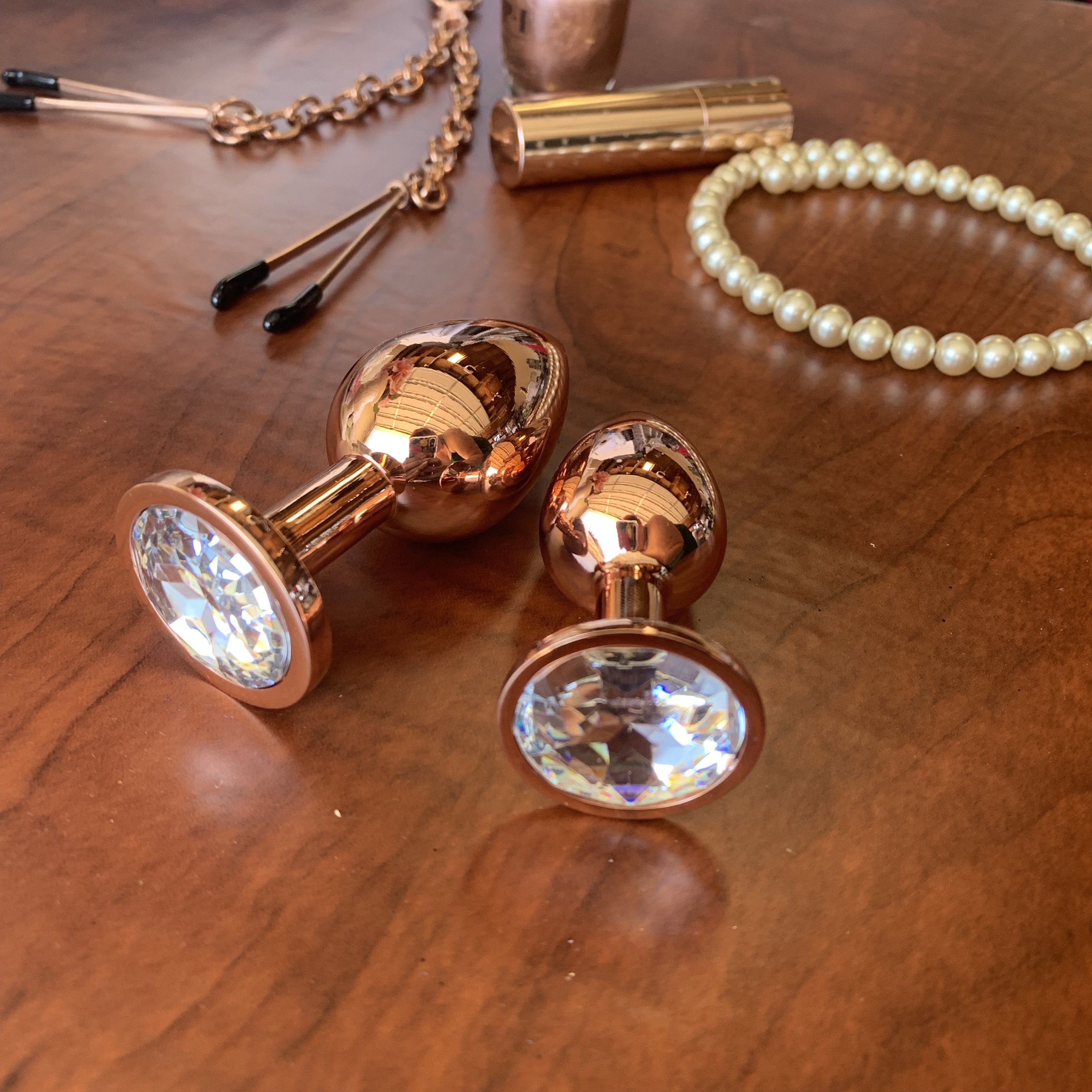 Rose Gold Butt Plug with Clear Crystal Plug Restrained Grace