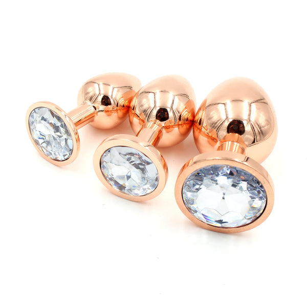 Rose Gold Butt Plug with Clear Crystal Plug Restrained Grace   