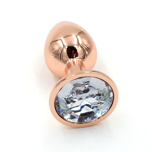 Rose Gold Butt Plug with Clear Crystal Plug Restrained Grace
