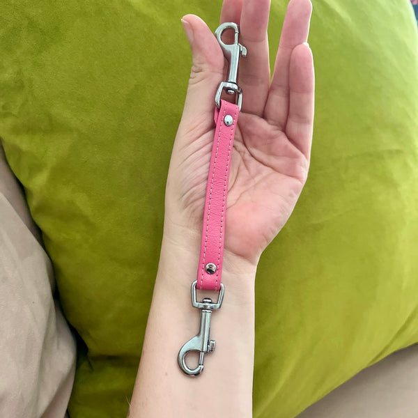 Pink glitter paddle shaped keychain, bondage keyring